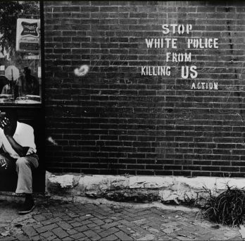 Darryl Cowherd Stop White Police from Killing Us – St. Louis, MO, c. 1966-67 Gelatin Silver Print Image: 15 x 19 in., mat: 20 x 24 ¼ in., paper 16 x 20 in
                  